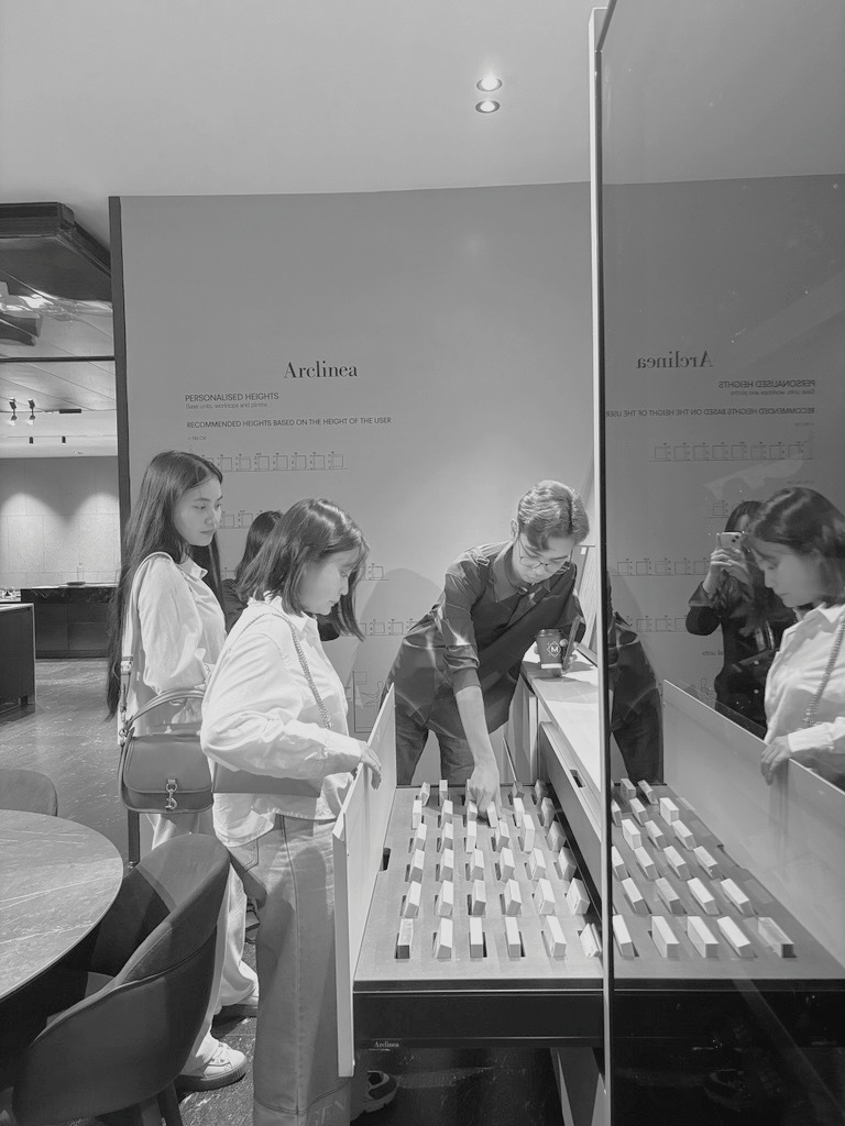 Three people looking at screens