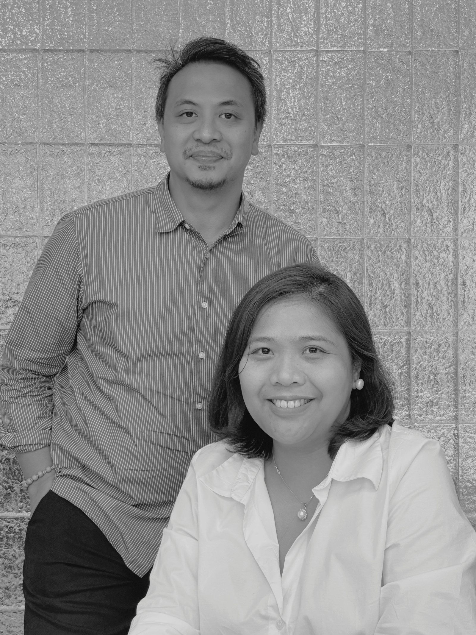 Woman with dark hair working at a computer